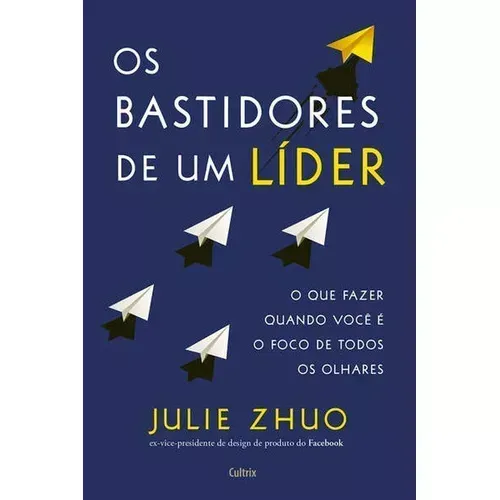 Capa do livro Os Bastidores de um Líder de Julie Zhuo. O fundo é azul escuro com aviões de papel branco e um avião amarelo. O subtítulo diz O que fazer quando você é o foco de todos os olhares.